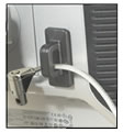 glue-on fastener with Guardian Lock securing a computer monitor