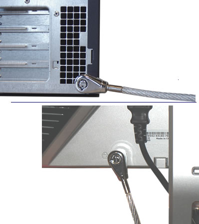 Guardian 820 lock with built in scissor clip attached to a computer and a monitor